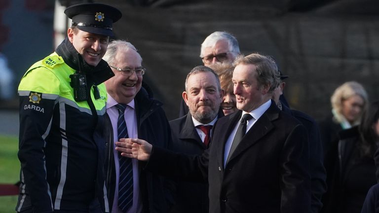 Former taoiseach Enda Kenny (right) at the church. Pic: Brian Lawless/PA Wire 