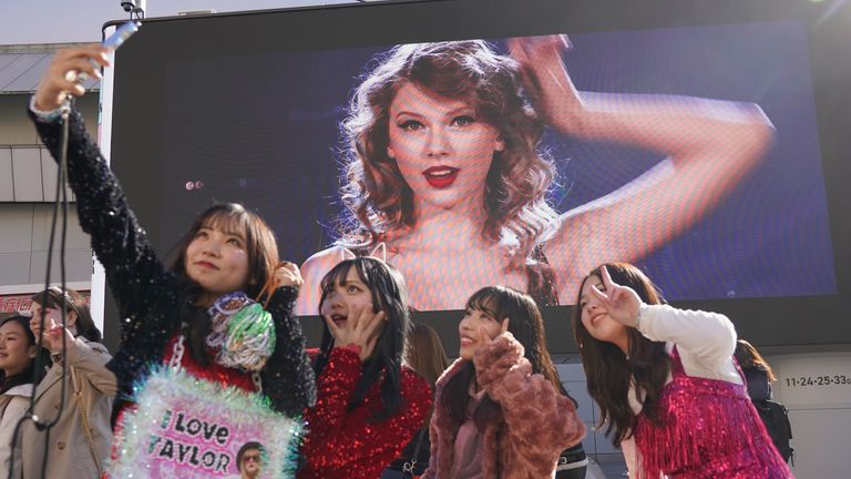 Fans arrive at the Tokyo Dome, for the Taylor Swift concert, as part of the Eras Tour .
Pic:AP
