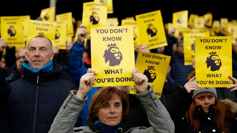 Everton fans hold up a sign in protest to Premier League&#39;s FFP ruling. Pic: Reuters/Jason Cairnduff