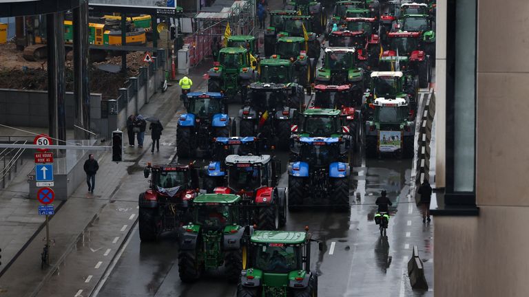 Farmers use tractors during a protest of European farmers over price pressures, taxes and green regulation, on the day of an EU Agriculture Ministers meeting in Brussels, Belgium February 26, 2024. REUTERS/Yves Herman