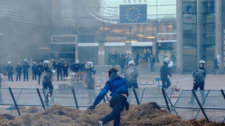 Farmers protest outside the European Union headquarters.
Pic: Reuters