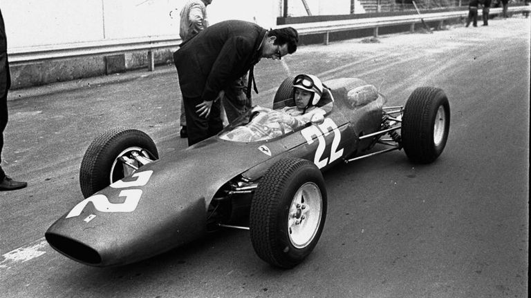 British driver John Surtees at the wheel of the new eight cylinder Italian Ferrari car, with which he will compete in the April 12, 1964 Syracuse Grand Prix Formula One Auto Race. (AP Photo/Girolamo di Majo)


