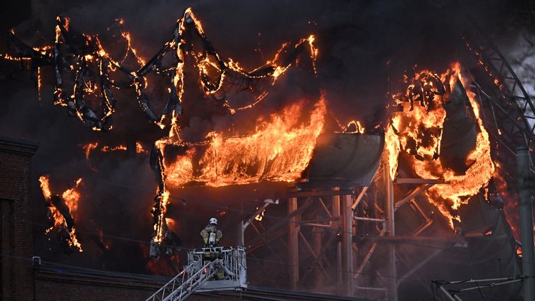 A firefighter works at the scene after a fire broke out at the new Oceana Water World at Liseberg amusement park in Gothenburg, Sweden, on February 12, 2024. Björn Larsson Rosvall/TT News Agency/via Reuters Attention Editors – This image was provided by a third party.  Sweden is out.  There are no commercial or editorial sales in Sweden.
