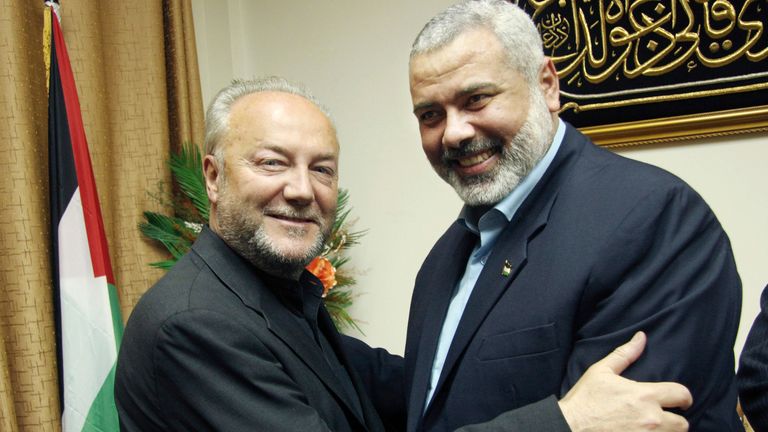 Senior Hamas leader Ismail Haniyeh (R) hugs British politician George Galloway during their meeting in Gaza, in this picture released by Haniyeh&#39;s office March 11, 2009. Galloway arrived in Gaza on Monday with an aid convoy loaded with humanitarian supplies organized by a British aid group. REUTERS/Mohammed al-Ostaz/Handout (GAZA POLITICS CONFLICT) FOR EDITORIAL USE ONLY. NOT FOR SALE FOR MARKETING OR ADVERTISING CAMPAIGNS
