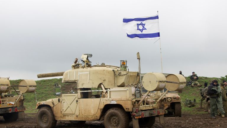 Still of an IDF military vehicle during drills in the Golan Heights. Alistair Bunkall piece.