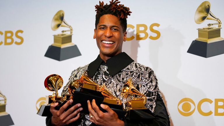 Jon Batiste, winner of the awards for best American roots performance for "Cry," best American roots song for "Cry," best music video for "Freedom," best score soundtrack for visual media for "Soul," and album of the year for "We Are," poses in the press room at the 64th Annual Grammy Awards at the MGM Grand Garden Arena on Sunday, April 3, 2022, in Las Vegas. Batiste turns 36 on Nov. 11. (AP Photo/John Locher, File)
