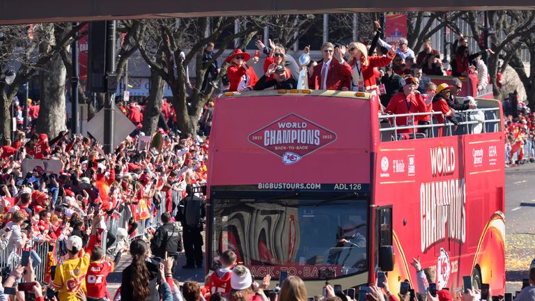Kansas City Chiefs chairman and CEO Clark Hunt holds the Vince Lombardi Trophy as their bus arrives at the victory rally in Kansas City, Mo., Wednesday, Feb. 14, 2024. The Chiefs defeated the San Francisco 49ers Sunday in the NFL Super Bowl 58 football game. (AP Photo/Reed Hoffmann)