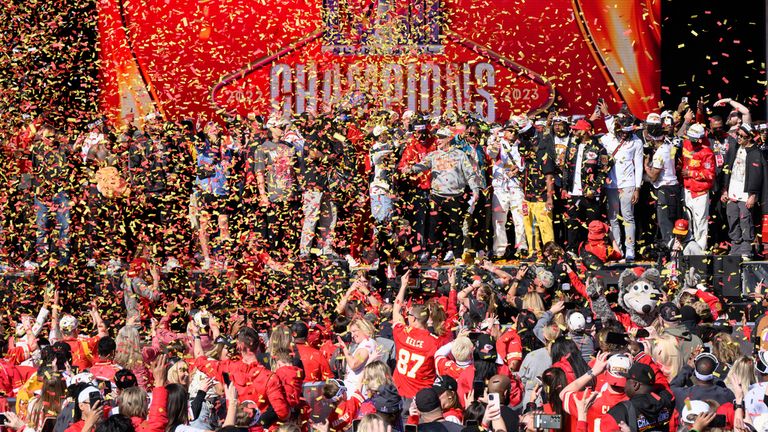 The Kansas City Chiefs celebrate during their victory rally in Kansas City, Mo., Wednesday, Feb. 14, 2024. The Chiefs defeated the San Francisco 49ers Sunday in the NFL Super Bowl 58 football game. (AP Photo/Reed Hoffmann)