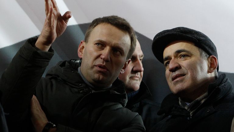 Prominent anti-corruption blogger Alexei Navalny (L) speaks with opposition leader Garry Kasparov during a protest demanding fair elections in central Moscow March 5, 2012. Thousands of protesters chanting "Russia without Putin" took to the streets of Moscow and St Petersburg on Monday to challenge Vladimir Putin&#39;s victory in a presidential election which international monitors said was unfair. REUTERS/Sergei Karpukhin (RUSSIA - Tags: POLITICS ELECTIONS CIVIL UNREST)
