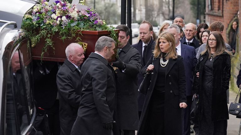 Pic: PA
Kate Garraway accompanies the coffin into the funeral service of her husband Derek Draper at St Mary the Virgin church in Primrose Hill, north west London. The former lobbyist turned psychologist and author, who married presenter Kate Garraway in 2005, died last month following long-lasting symptoms from coronavirus. Picture date: Friday February 2, 2024.