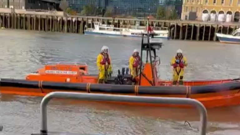 Lifeboat crews at the scene after the discovery of the body of the Clapham chemical attack suspect, Abdul Ezedi, in the River Thames. 