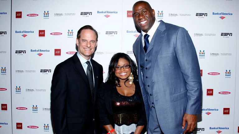 Left to right: AIDS Healthcare Foundation president Michael Weinstein, Hydeia Broadbent and Magic Johnson in 2011. Pic: AP