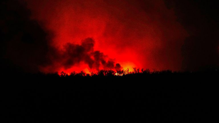 A wildfire that prompted evacuations burns north of Shattuck, Oklahoma, U.S. February 27, 2024. REUTERS/Nick Oxford
