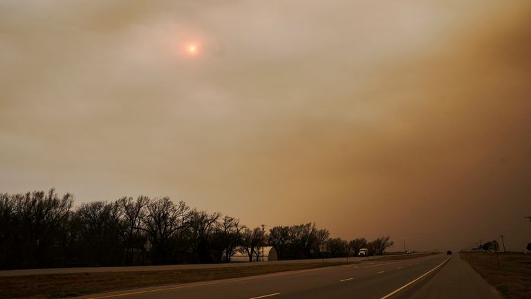Smoke from multiple wildfires obscures the sun near Seiling, Oklahoma, U.S. February 27, 2024. REUTERS/Nick Oxford
