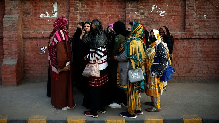 Voters outside a polling station in Lahore, Pakistan. Pic: Reuters