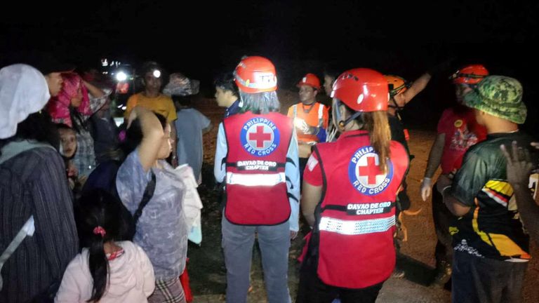 People partake in rescue operations following a landslide on Mindanao island, in the village of Maco, Davao de Oro province, Philippines February 7, 2024 in this image obtained from social media. Philippine Red Cross via REUTERS THIS IMAGE HAS BEEN SUPPLIED BY A THIRD PARTY. MANDATORY CREDIT. NO RESALES. NO ARCHIVES.