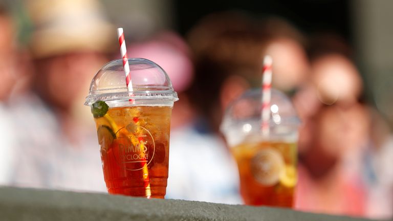 Tennis - Wimbledon - All England Lawn Tennis and Croquet Club, London, Britain - July 3, 2018. Glasses of Pimms sit on a wall during Aliaksandra Sasnovich of Belarus&#39; first round match against Petra Kvitova of the Cezh Republic. REUTERS/Andrew Boyers