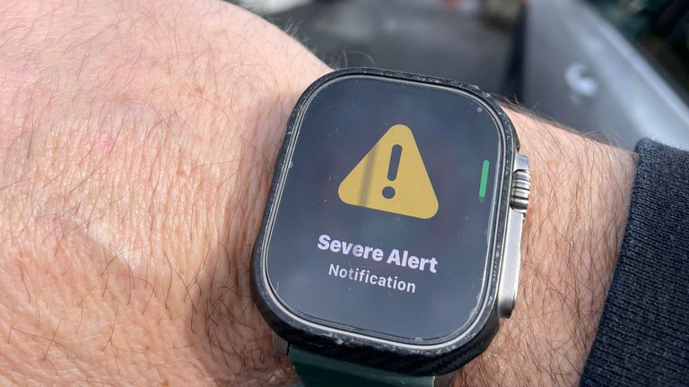 The Severe Alert text message appears on a smart watch that was sent to local residents warning that the Second World War explosive device will be removed from a garden in Plymouth 