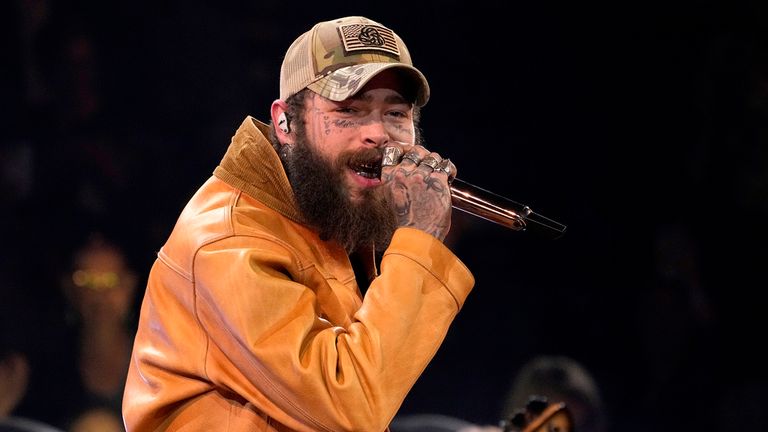 Post Malone performs a medley at the 57th Annual CMA Awards on Wednesday, Nov. 8, 2023, at the Bridgestone Arena in Nashville, Tenn. (AP Photo/George Walker IV)