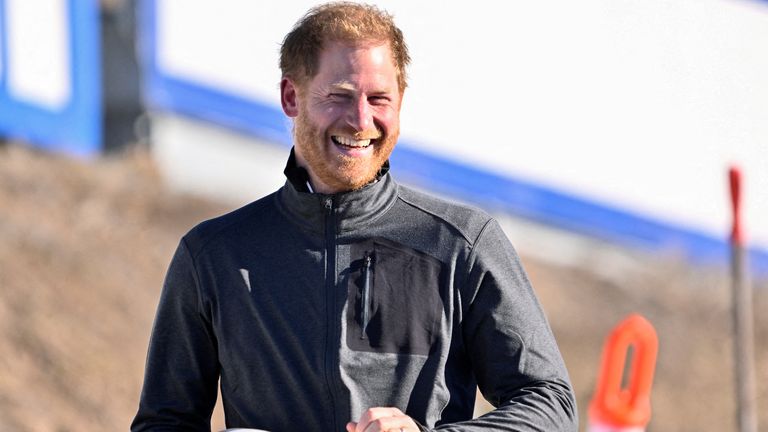 Prince Harry was delighted after completing the track - and went back for a second go Pic: Reuters
