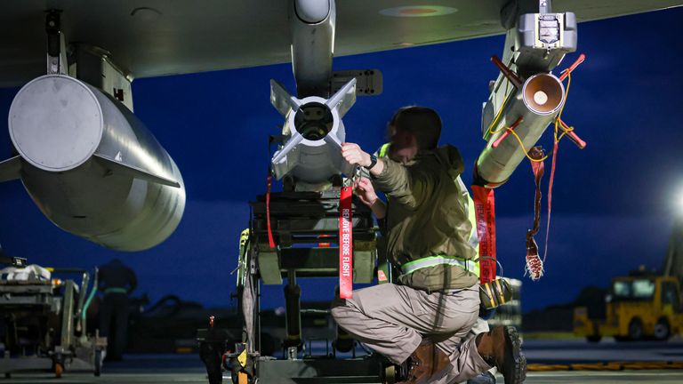 RAF Weapon Technicians prepare RAF Typhoon FRG4 aircraft to conduct further strikes against Houthi military targets in Yemen, from RAF Akrotiri, Cyprus, Saturday, Feb. 3, 2024. (Cpl Samantha Drummee/Ministry of Defence via AP)