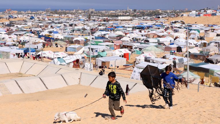 Displaced Palestinians take shelter in a tent camp in Rafah. Pic: Reuters