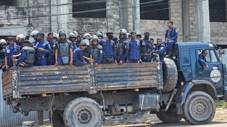 Riot police stand on a truck during a protest in Kinshasa. Pic: Reuters