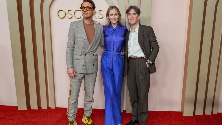 Robert Downey Jr, from left, Emily Blunt and Cillian Murphy, arrives at the 96th Academy Awards Oscar nominees luncheon on Monday, Feb. 12, 2024, at the Beverly Hilton Hotel in Beverly Hills, Calif. (Photo by Jordan Strauss/Invision/AP)