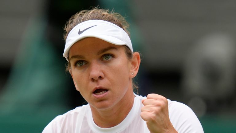 FILE - Romania&#39;s Simona Halep reacts as she plays Amanda Anisimova, of the United States, in a women&#39;s singles quarterfinal match on the tenth day of the Wimbledon tennis championships in London, July 6, 2022. Two-time Grand Slam champion Halep has been accused of a second doping offense by the International Tennis Integrity Agency for irregularities in her Athlete Biological Passport. The charge announced Friday, May 19, 2023, ...is separate and in addition to... the provisional suspension Halep received last year after failing a drug test during the U.S. Open in August, the ITIA said. (AP Photo/Kirsty Wigglesworth, File)