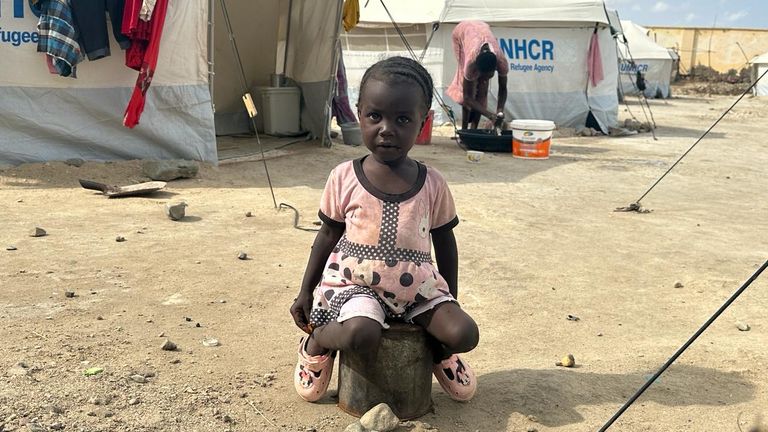 A young girl inside the camp
