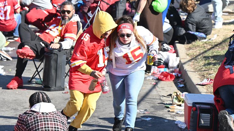 Feb 14, 2024; Kansas City, MO, USA; Fans leave the area after shots were fired after the celebration of the Kansas City Chiefs winning Super Bowl LVIII. Mandatory Credit: David Rainey-USA TODAY Sports