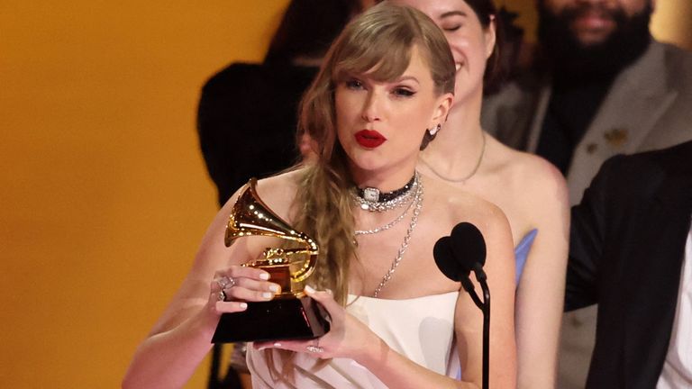 Taylor Swift accepts the award for Album of the Year for Midnights during the 66th Annual Grammy Awards in Los Angeles, California, U.S., February 4, 2024. REUTERS/Mike Blake
