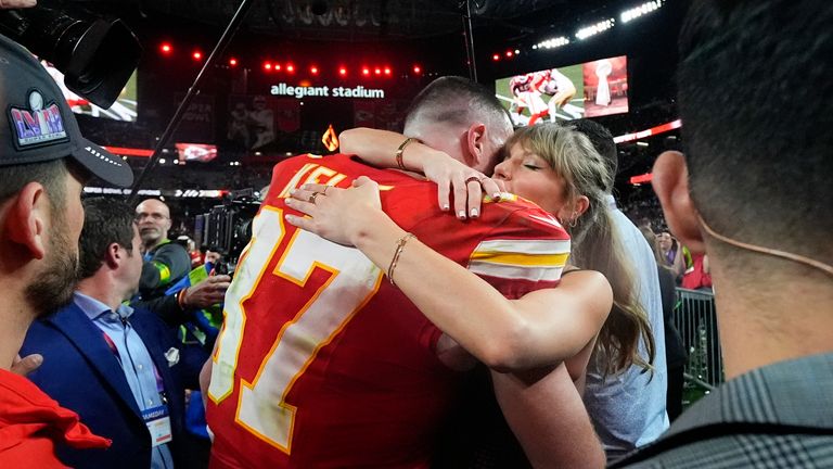 Taylor Swift embraces Kansas City Chiefs tight end Travis Kelce after the NFL Super Bowl 58 football game against the San Francisco 49ers on Sunday, Feb. 11, 2024, in Las Vegas. The Chiefs won 25-22 against the 49ers. (AP Photo/Julio Cortez)