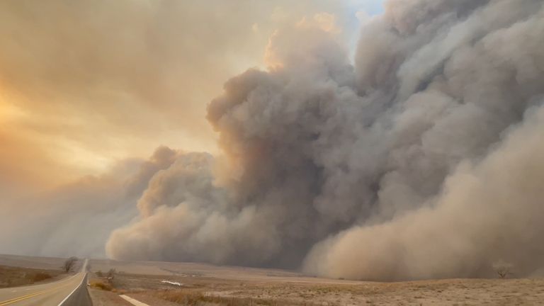 Smoke rises from a wildfire in Texas, U.S., February 27, 2024 in this screen grab obtained from a social media video. Jeff Bartlett/via REUTERS THIS IMAGE HAS BEEN SUPPLIED BY A THIRD PARTY. MANDATORY CREDIT. NO RESALES. NO ARCHIVES.

