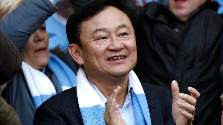 Manchester City&#39;s former owner Thaksin Shinawatra sits amongst supporters before a match against Manchester United, 30 April 2012. Pic: AP