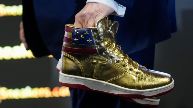 Donald Trump promotes golden 'Never Surrender Hi-Top' trainers for $399 a  pair | US News | Sky News