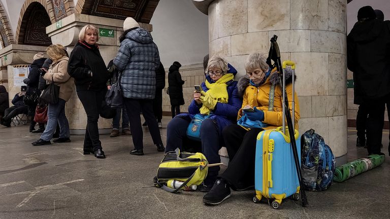 People taker shelter inside a metro station during a Russian missile strike in Kyiv, Ukraine.
Pic: Reuters