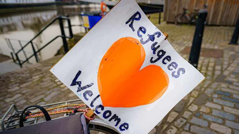 A &#39;refugees welcome&#39; banner attached to a bicycle by a small flotilla of boats leaving Bristol harbour in support of Ukrainian refugees during a day of national action showing support for refugees. Picture date: Monday March 21, 2022.
