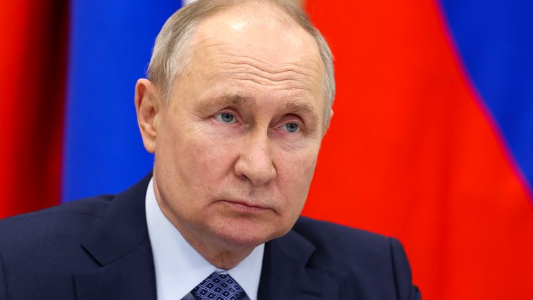 FILE - Russian President Vladimir Putin attends a meeting with officials in the town of Tsivilsk, Republic of Chuvash, Russia, Feb. 22, 2024. The U.S. government is hitting Russia with the largest tranche of financial penalties imposed on Moscow since its 2022 invasion of Ukraine. They target roughly 600 people and firms from Russia to China to the United Arab Emirates. (Alexander Kazakov, Sputnik, Kremlin Pool Photo via AP, File)