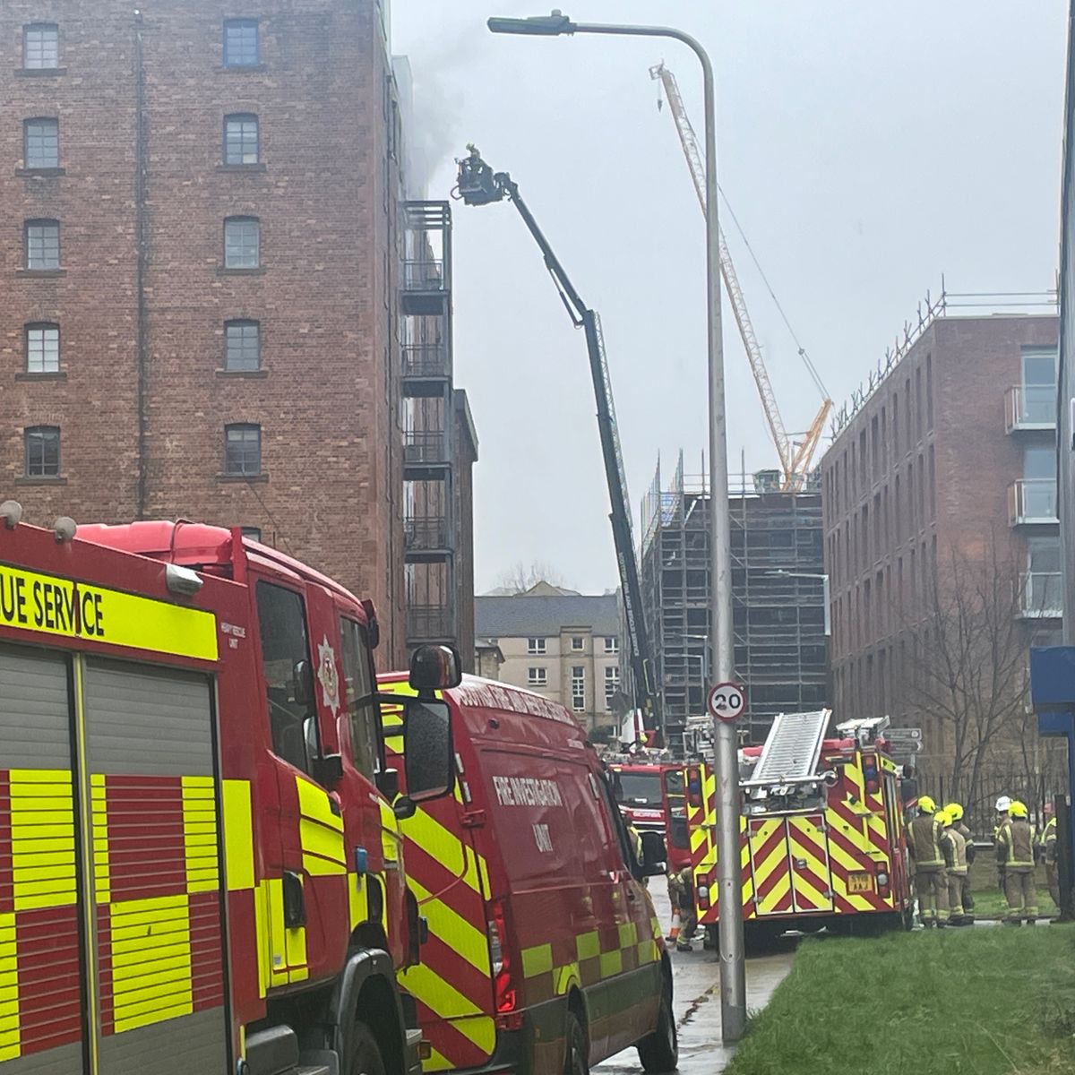 Firefighters injured and MSP among 100 residents evacuated from flats ...