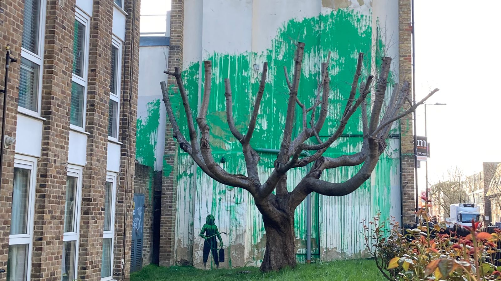 Banksy artwork appears on side of flats in north London