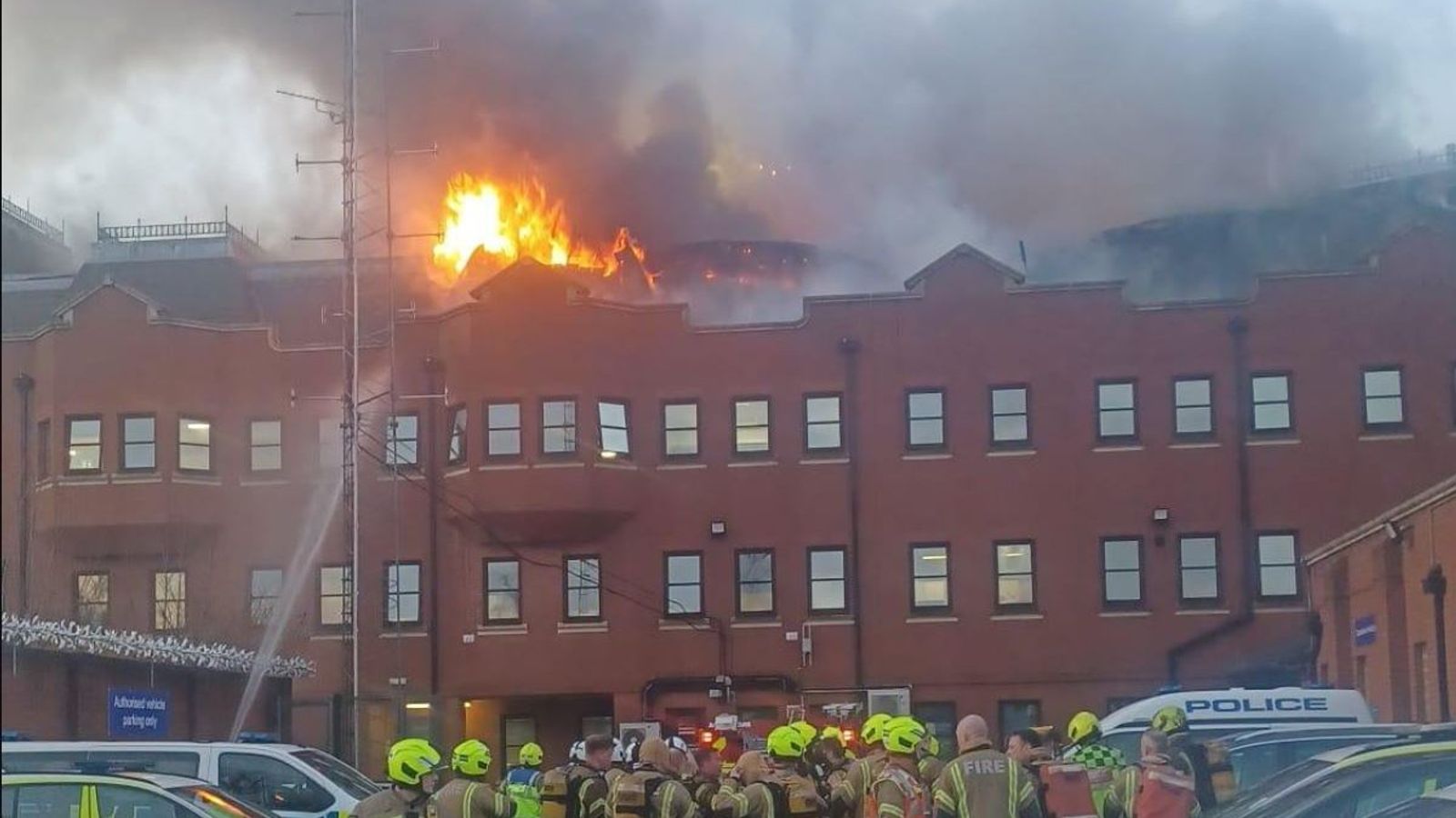 Roof 'completely destroyed as more than 170 firefighters tackle blaze at London police station