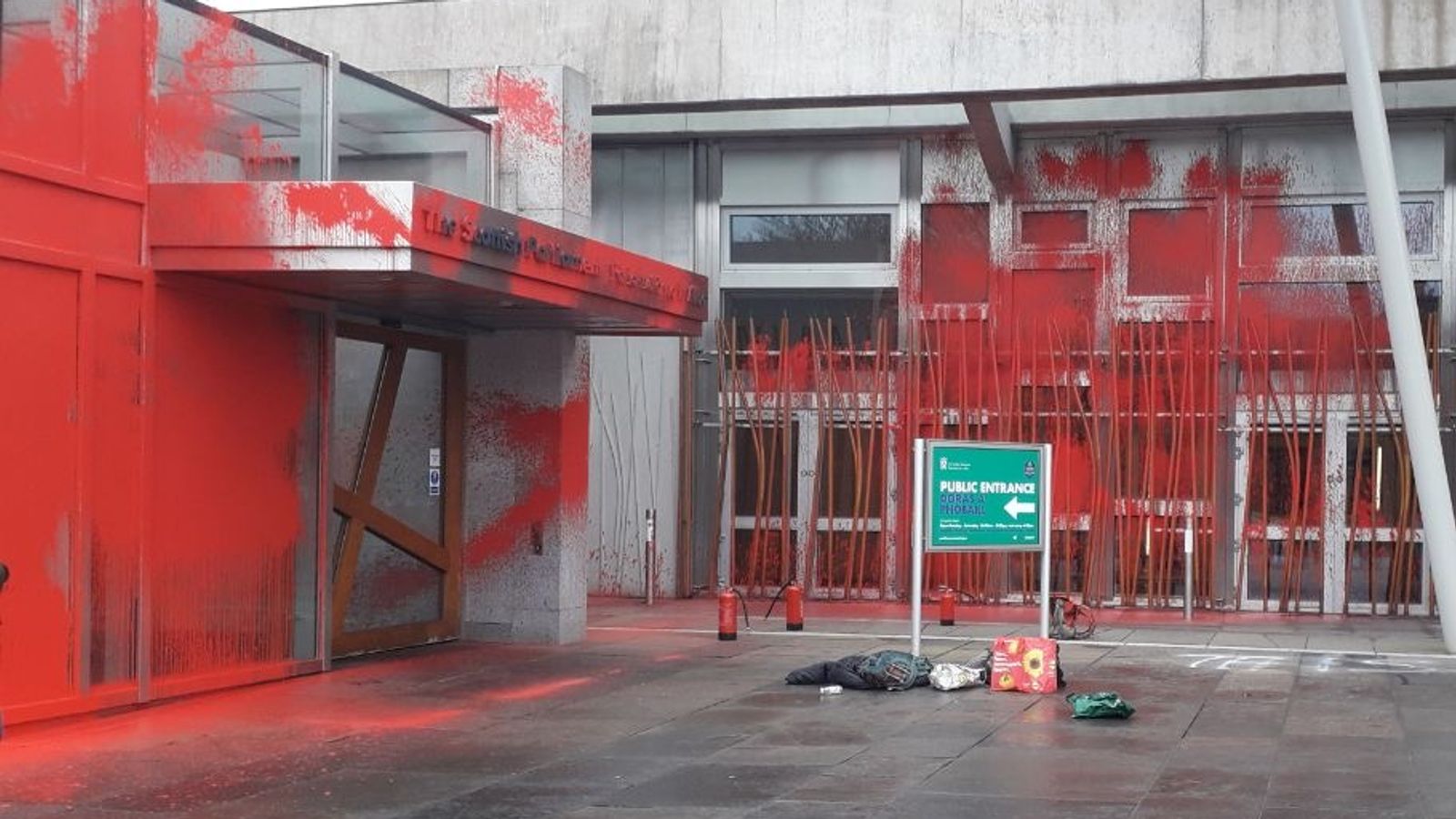 Three people arrested as red paint sprayed on Scottish Parliament in food insecurity protest