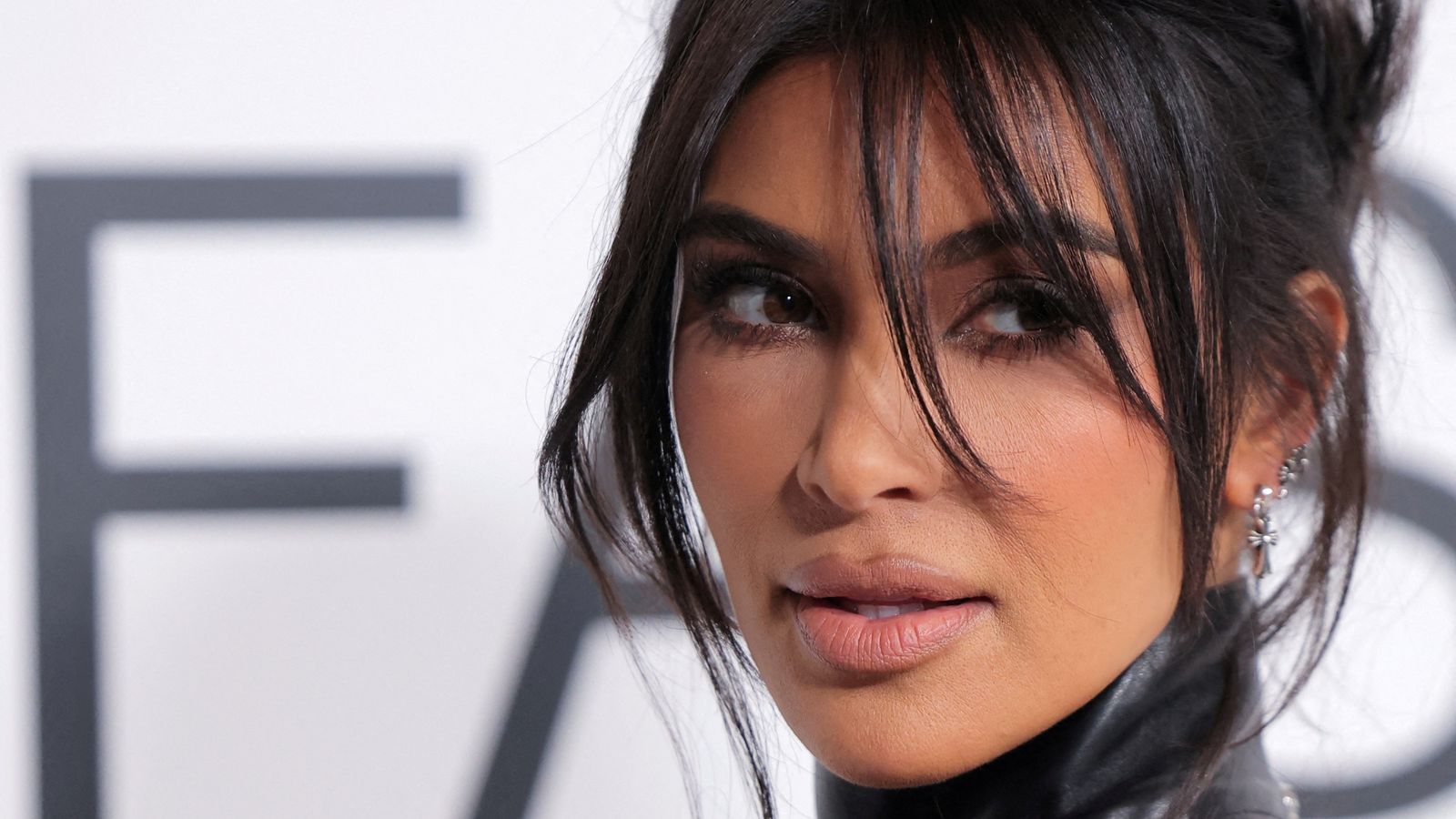 Kim Kardashian leaves tag on Balenciaga dress at Paris Fashion Show event