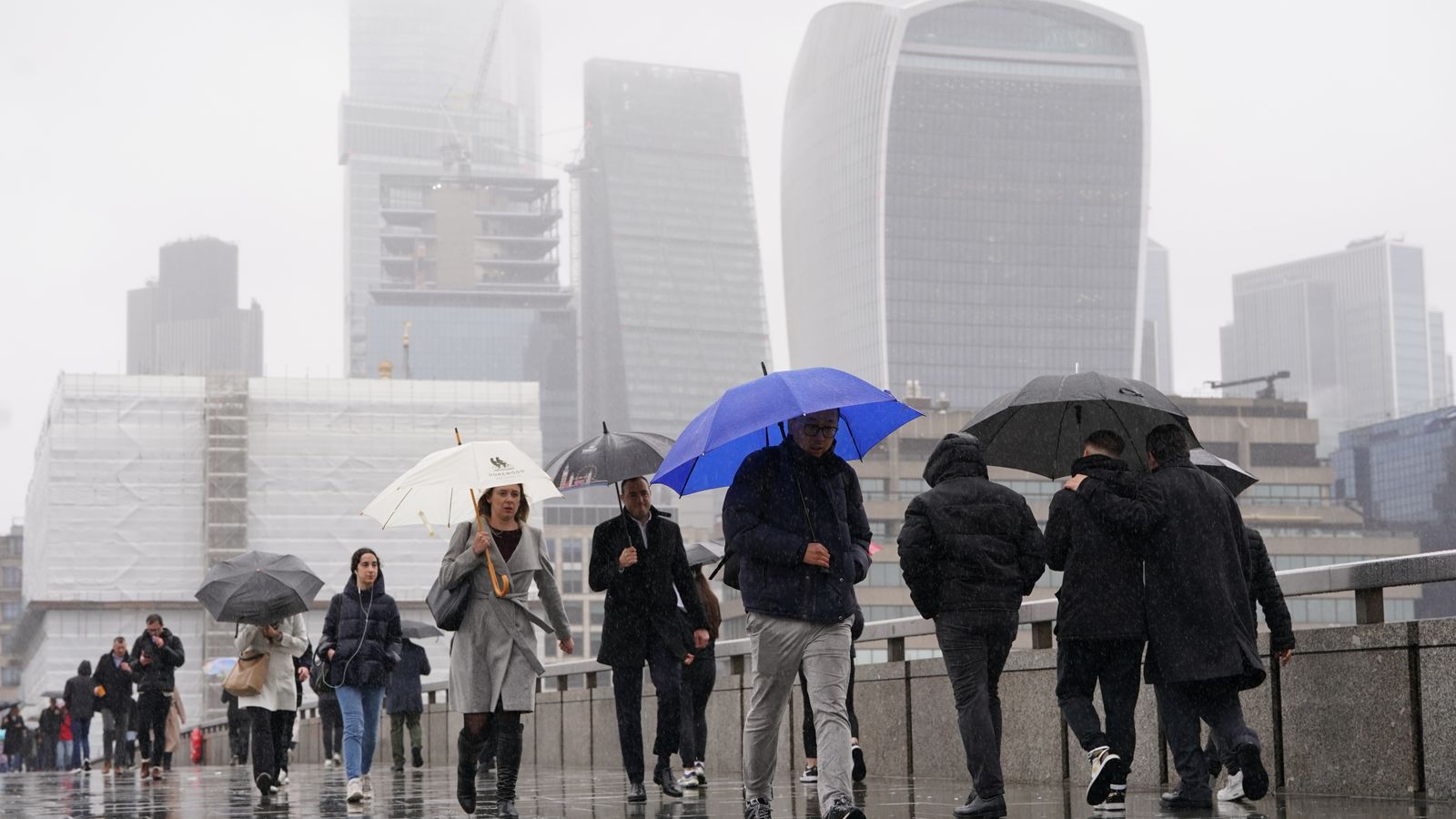 UK set to grow less than expected this year as IMF revises forecasts down