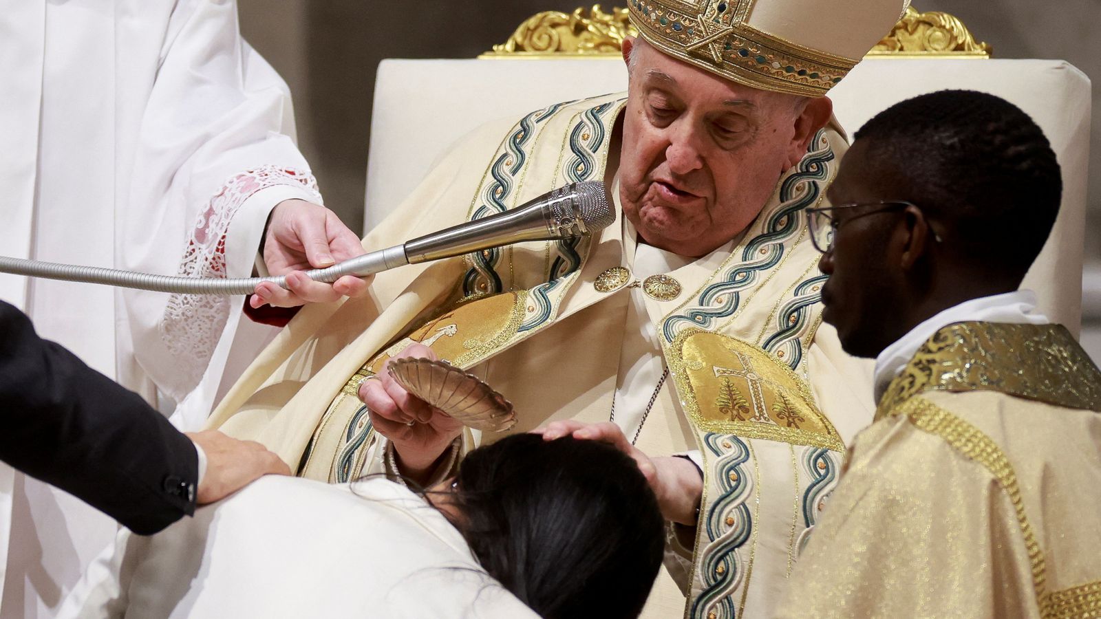 Pope Francis prays at Easter Vigil in the Vatican after Good Friday ...