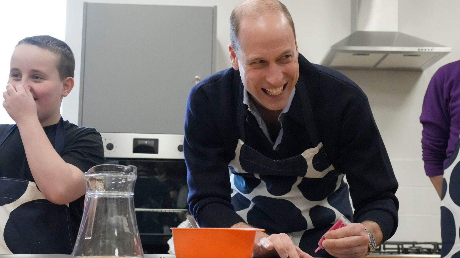 Prince William sings wife Kate's praises on youth centre visit