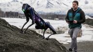 Alaska Department of Transportation program manager Ryan Marlow demonstrates the agency&#39;s robotic dog in Anchorage, Alaska, on March 26, 2024. The device will be camouflaged as a coyote or fox to ward off migratory birds and other wildlife at Alaska&#39;s second largest airport, the DOT said. (Marc Lester/Anchorage Daily News via AP)