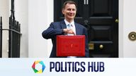 Jeremy Hunt poses with the red budget box.
Pic: Reuters