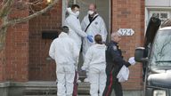 Police and members of the coroner&#39;s office at the crime scene Pic: Patrick Doyle /The Canadian Press/ AP